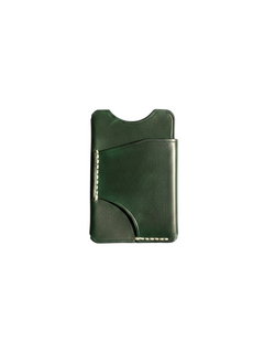 Hidden House Co. forest green leather card holder with contrast saddle stitching and a slim minimalist design.