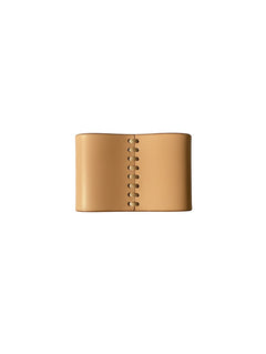 Hidden House Co. handcrafted tan vegetable-tanned leather scarf slide with rustic hand-stitched center detail