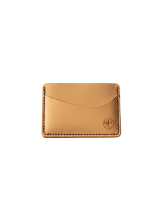 Hidden House Co. minimalist vegetable-tanned leather card holder in light tan with contrasting dark stitching