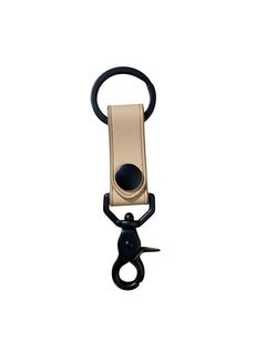 Hidden House Co. minimalist tan leather keychain with matte black metal split ring and swivel lobster clasp